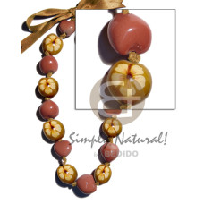 Kukui nuts in painted graduated